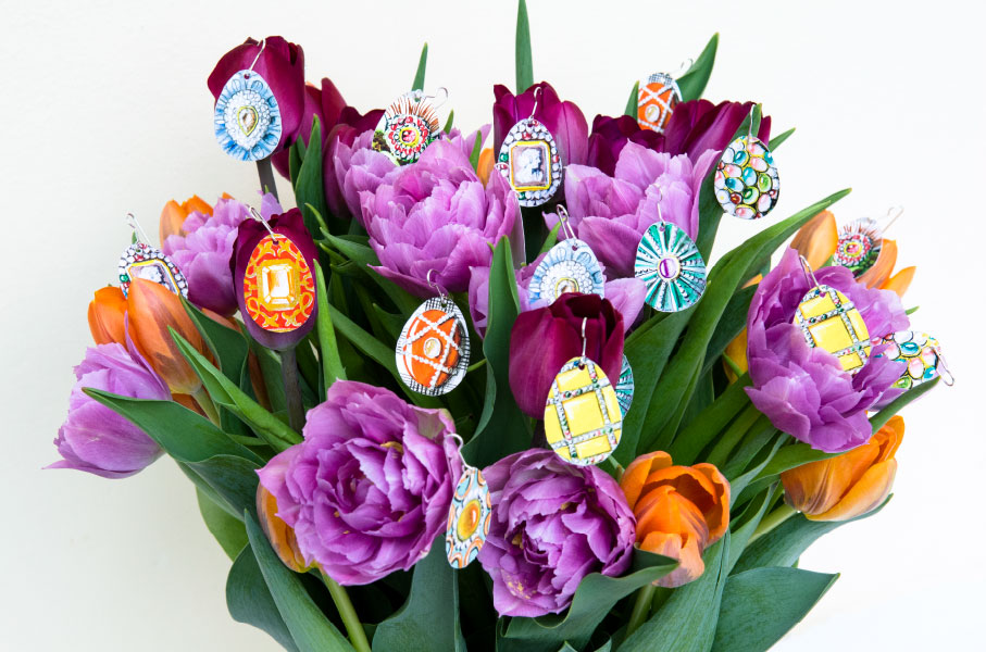 bodyfurnitures easter egg paper earrings on tulip flowers bouquet