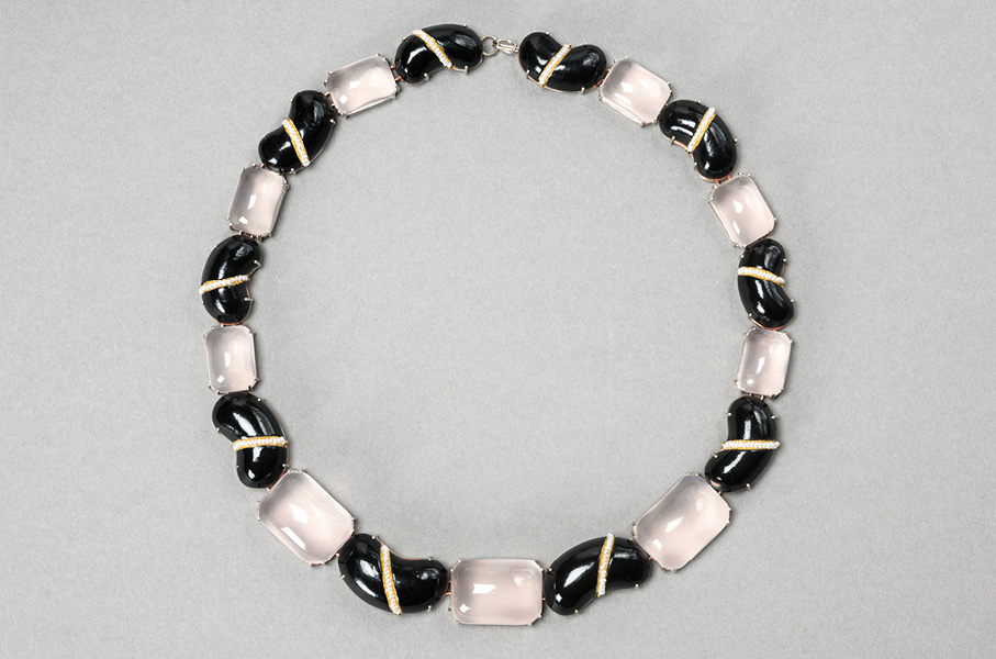 Contemporary jewelry “Necklace Faba” 2023, black color with rose quarz, pearls. One-of-a-kind artwork by Gian Luca Bartellone from Italy