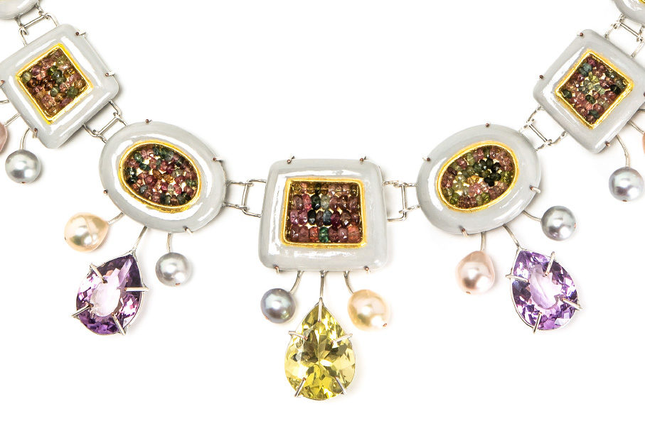 Rich details of italian contemporary jewelry. Closeup colorful materials: papier-mâché, silver-plated copper, citrine, rose amethysts, tourmalines, pearls, paper, gold leaf 22kt. Jeweller Bartellone, Bodyfurnitures, Bolzano.